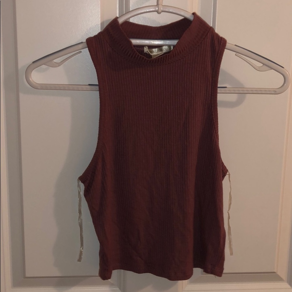 Never worn. Needs a new home